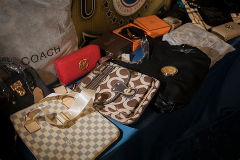 is buying fake designer bags illegal|selling branded purses legal.